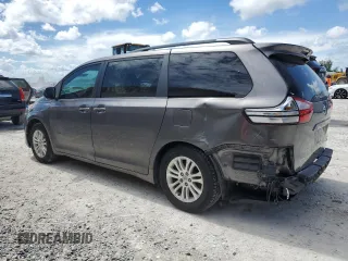 2015 Toyota Sienna XLE with VIN 5TDYK3DCXFS668851, listed as a Copart auction lot 60452005 with 205,549 mi miles and Salvage title. Bid and sale history available at DreamBid. Image 2.
