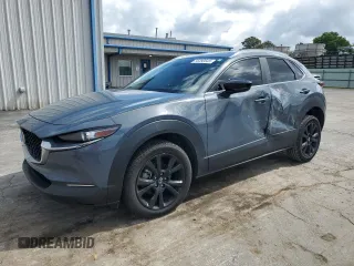 2022 Mazda CX-30 S Carbon Edition с VIN 3MVDMBCL8NM422236, выставлен на аукционе Copart как лот 56390645 с пробегом 61 087 миль миль и Списание • Salvage title. История ставок и продаж доступна на DreamBid. Изображение 1.
