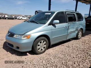 2003 Honda Odyssey EX-L with VIN 5FNRL18913B068269, listed as a Copart auction lot 58089565 with 203,885 mi miles and Salvage title. Bid and sale history available at DreamBid. Image 1.