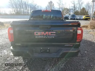 2024 GMC Canyon 4WD AT4 with VIN 1GTP6DEK2R1180037, listed as a Copart auction lot 85656994 with 7,565 mi miles and Salvage Title. Bid and sale history available at carsss.com. Image 6.