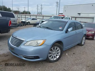 2014 Chrysler 200 Touring with VIN 1C3CCBBB3EN136829, listed as a IAAI auction lot 41279121 with 122,947 mi miles. Bid and sale history available at carsss.com. Image 2.
