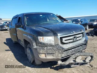 2011 Honda Ridgeline RTS with VIN 5FPYK1F48BB005889, listed as a IAAI auction lot 41761367 with 146,974 mi miles. Bid and sale history available at carsss.com. Image 1.