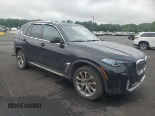 2024 BMW X5 sDrive40i with VIN 5UX13EU03R9V08439, listed as a Copart auction lot 61158915 with Not provided miles and Clean title. Bid and sale history available at DreamBid. Image 4.