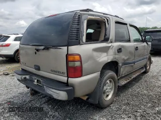 2002 Chevrolet Tahoe LS with VIN 1GNEC13Z52J232577, listed as a Copart auction lot 58770895 with 240,960 mi miles and Salvage title. Bid and sale history available at DreamBid. Image 3.