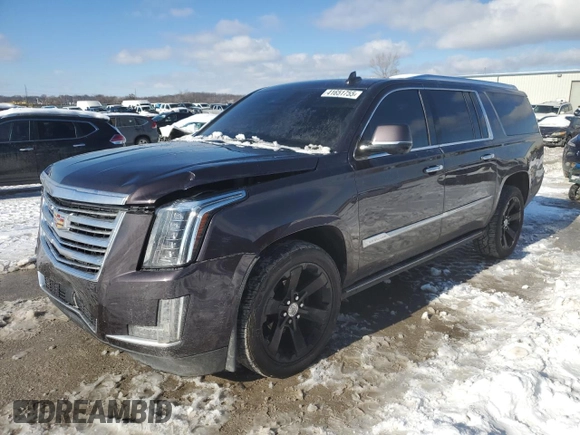 2015 Cadillac Escalade ESV Platinum z VIN 1GYS4UKJ1FR565785, wystawiony jako Copart lot #41651755 z przebiegiem 165 197 mil mil oraz Szkoda całkowita • Salvage title. Historia ofert i sprzedaży dostępna na DreamBid. Obrazek 1.