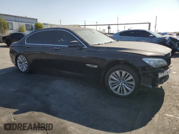 2015 BMW 7 Series 740Li with VIN WBAYE4C52FD946831, listed as a Copart auction lot 49014195 with 137,447 mi miles and Salvage Title. Bid and sale history available at DreamBid. Image 4.
