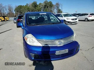 2009 Nissan Versa 1.8 SL with VIN 3N1BC13E69L407515, listed as a Copart auction lot 42767375 with 134,489 mi miles and Salvage Title. Bid and sale history available at carsss.com. Image 10.