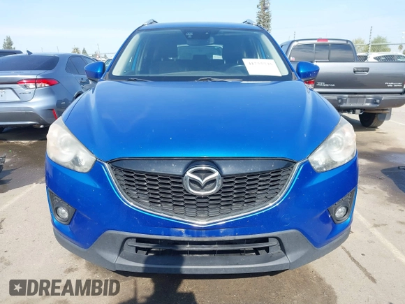 2014 Mazda CX-5 Grand Touring with VIN JM3KE4DY1E0327703, listed as a IAAI auction lot 41755735 with 206,845 mi miles. Bid and sale history available at carsss.com. Image 12.