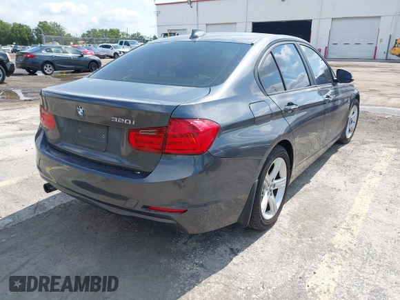 2013 BMW 3 Series 320i with VIN WBA3B1C5XDF462859, listed as a IAAI auction lot 42191369 with 140,253 mi miles and . Bid and sale history available at carsss.com. Image 4.