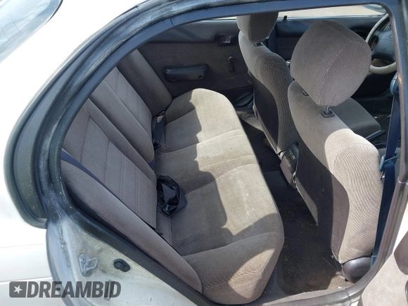1994 Toyota Corolla Deluxe with VIN JT2AE09B5R0053731, listed as a IAAI auction lot 42606147 with 117,035 mi miles and . Bid and sale history available at DreamBid. Image 8.