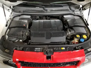 2012 Land Rover Range Rover Sport HSE Lux z VIN SALSK2D40CA720711, wystawiony jako Copart lot #51654625 z przebiegiem 123 042 mil mil oraz Szkoda całkowita • Salvage title. Historia ofert i sprzedaży dostępna na DreamBid. Obrazek 12.