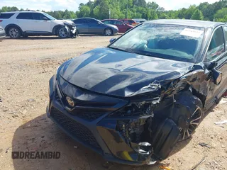 2018 Toyota Camry LE z VIN 4T1B11HKXJU652275, wystawiony jako IAAI lot #42245625 z przebiegiem 49 596 mil mil oraz . Historia ofert i sprzedaży dostępna na DreamBid. Obrazek 17.