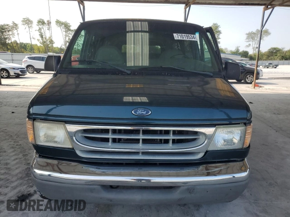 1998 Ford Econoline Wagon XL z VIN 1FBSS31S7WHB00261, wystawiony jako Copart lot #71019534 z przebiegiem 230 030 mil mil oraz Szkody całkowita. Historia ofert i sprzedaży dostępna na DreamBid. Obrazek 5.
