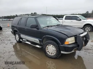 2000 GMC Jimmy Diamond Edition Luxury with VIN 1GKDT13W7Y2283256, listed as a Copart auction lot 44202425 with 292,423 mi miles and Salvage Title. Bid and sale history available at carsss.com. Image 4.