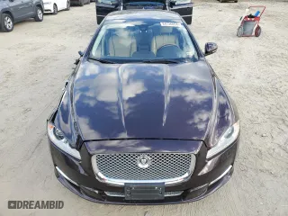 2013 Jaguar XJ with VIN SAJWA2G12DLV57581, listed as a Copart auction lot 84736054 with 91,779 mi miles and Salvage Title. Bid and sale history available at carsss.com. Image 5.