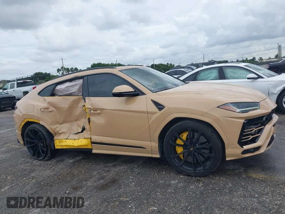 2022 Lamborghini Urus z VIN ZPBUA1ZL3NLA18265, wystawiony jako IAAI lot #40675659 z przebiegiem 46 439 mil mil oraz . Historia ofert i sprzedaży dostępna na DreamBid. Obrazek 13.