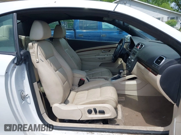 2008 Volkswagen Eos Lux z VIN WVWFA71F88V018635, wystawiony jako IAAI lot #42220306 z przebiegiem 155 448 mil mil oraz . Historia ofert i sprzedaży dostępna na DreamBid. Obrazek 5.