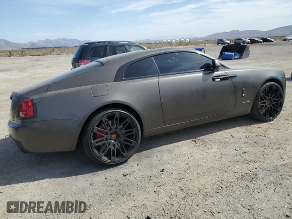 2014 Rolls-Royce Wraith z VIN SCA665C57EUX84259, wystawiony jako Copart lot #65586204 z przebiegiem 52 048 mil mil oraz Szkody całkowita. Historia ofert i sprzedaży dostępna na DreamBid. Obrazek 3.