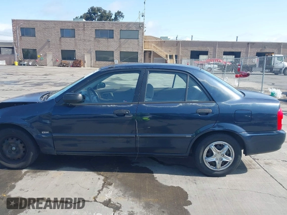 1999 Mazda Protege DX z VIN JM1BJ2229X0189290, wystawiony jako IAAI lot #41796448 z przebiegiem 281 528 mil mil oraz . Historia ofert i sprzedaży dostępna na DreamBid. Obrazek 15.