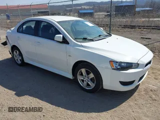 2014 Mitsubishi Lancer SE with VIN JA32V2FW1EU000671, listed as a IAAI auction lot 41792196 with 131,730 mi miles. Bid and sale history available at carsss.com. Image 1.