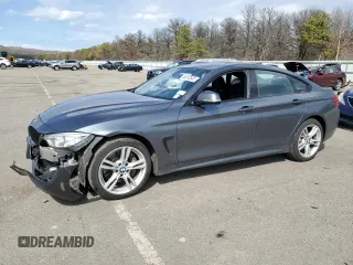 2016 BMW 4 Series 428i xDrive with VIN WBA4C9C50GG137720, listed as a Copart auction lot 50240545 with 60,705 mi miles and Salvage Title. Bid and sale history available at carsss.com. Image 1.