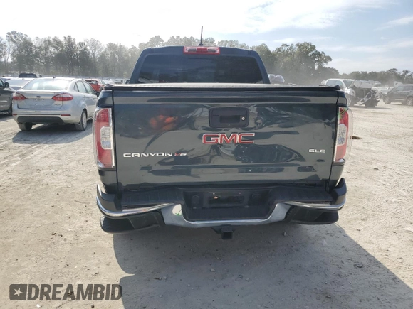 2019 GMC Canyon 4WD SLE with VIN 1GTG6CEN1K1129624, listed as a Copart auction lot 44106575 with 106,734 mi miles and Salvage Title. Bid and sale history available at carsss.com. Image 6.
