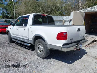 2003 Ford F-150 XLT with VIN 1FTRW07L83KD94698, listed as a IAAI auction lot 41807821 with 177,750 mi miles. Bid and sale history available at carsss.com. Image 3.