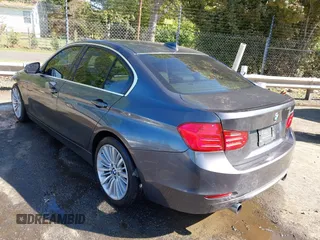2013 BMW 3 Series ActiveHybrid 3 with VIN WBA3F9C5XDF484346, listed as a IAAI auction lot 41998341 with 145,271 mi miles. Bid and sale history available at carsss.com. Image 3.