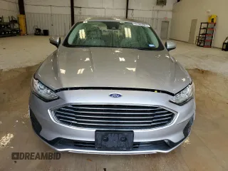 2020 Ford Fusion SE z VIN 3FA6P0LUXLR194471, wystawiony jako Copart lot #55616175 z przebiegiem 94 169 mil mil oraz Tytuł czysty. Historia ofert i sprzedaży dostępna na DreamBid. Obrazek 5.