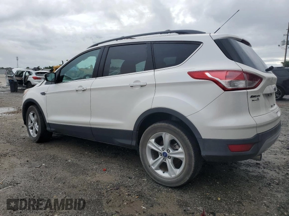 2013 Ford Escape SE with VIN 1FMCU0GX3DUB86597, listed as a Copart auction lot 59513935 with 94,293 mi miles and Salvage title. Bid and sale history available at DreamBid. Image 2.