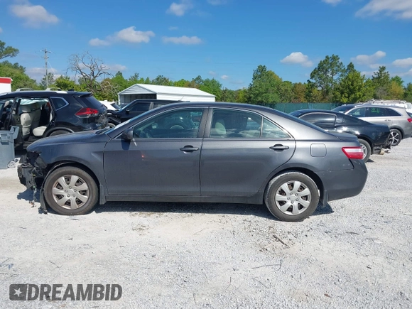 2009 Toyota Camry with VIN 4T1BE46KX9U879566, listed as a IAAI auction lot 42020660 with 207,291 mi miles. Bid and sale history available at carsss.com. Image 15.