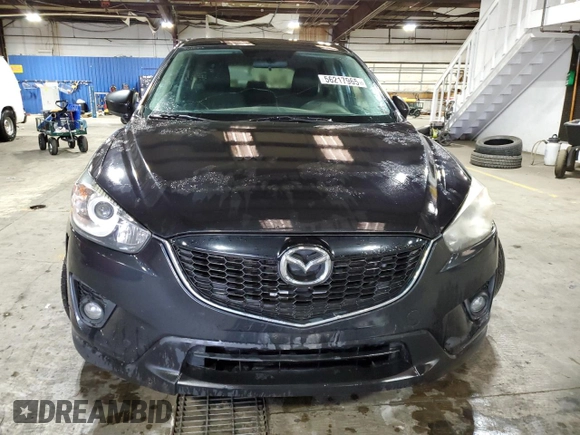 2013 Mazda CX-5 Touring with VIN JM3KE4CE8D0121607, listed as a Copart auction lot 56217965 with 143,861 mi miles and Clean Title. Bid and sale history available at DreamBid. Image 5.