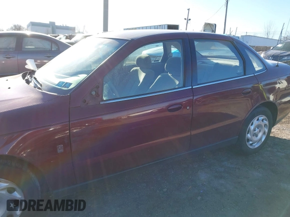 2001 Saturn LS z VIN 1G8JU52F41Y561483, wystawiony jako IAAI lot #41456949 z przebiegiem 130 852 mil mil oraz . Historia ofert i sprzedaży dostępna na DreamBid. Obrazek 6.