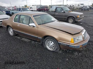 1985 Ford Thunderbird with VIN 1FABP46F2FH175017, listed as a IAAI auction lot 42222867 with 77,911 mi miles and . Bid and sale history available at DreamBid. Image 1.