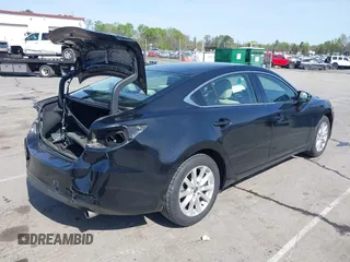 2016 Mazda Mazda6 i Sport with VIN JM1GJ1U54G1422560, listed as a IAAI auction lot 41935881 with 87,030 mi miles. Bid and sale history available at carsss.com. Image 4.