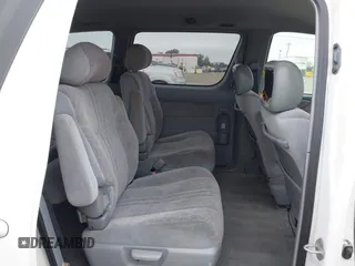 1999 Toyota Sienna LE with VIN 4T3ZF13C2XU105212, listed as a IAAI auction lot 42066557 with 153,659 mi miles. Bid and sale history available at carsss.com. Image 8.