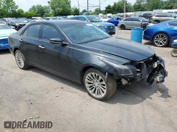 2016 Cadillac CTS Luxury Collection AWD with VIN 1G6AX5SX0G0102225, listed as a Copart auction lot 60400525 with 115,935 mi miles and Salvage title. Bid and sale history available at DreamBid. Image 4.