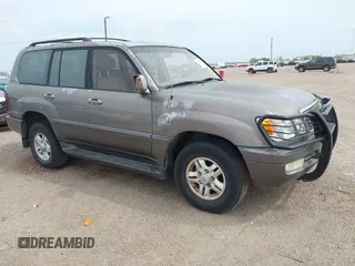 1999 Lexus LX 470 with VIN JT6HT00W8X0068157, listed as a IAAI auction lot 41955366 with 291,014 mi miles and . Bid and sale history available at DreamBid. Image 1.