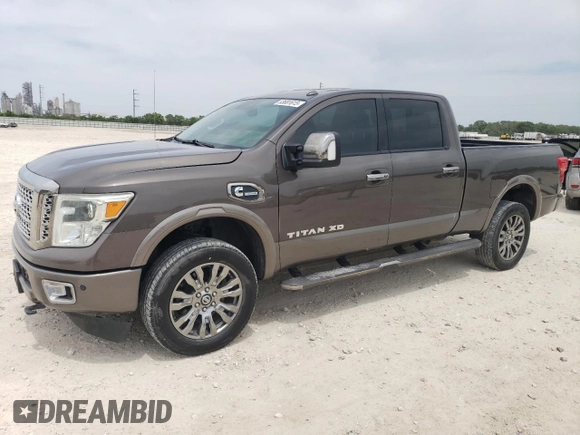 2016 Nissan Titan Platinum Reserve z VIN 1N6BA1F27GN507136, wystawiony jako Copart lot #53681615 z przebiegiem 155 101 mil mil oraz Czysty tytuł • Clean title. Historia ofert i sprzedaży dostępna na DreamBid. Obrazek 1.