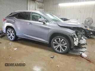 2022 Lexus RX 350 with VIN 2T2HZMDA8NC309467, listed as a Copart auction lot 49897385 with 36,795 mi miles and Salvage Title. Bid and sale history available at DreamBid. Image 4.