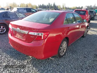2014 Toyota Camry L with VIN 4T4BF1FK7ER356016, listed as a IAAI auction lot 41997772 with 124,962 mi miles. Bid and sale history available at carsss.com. Image 4.