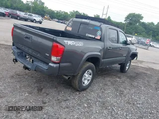 2017 Toyota Tacoma SR5 with VIN 3TMCZ5ANXHM089093, listed as a IAAI auction lot 42513711 with 86,022 mi miles and . Bid and sale history available at DreamBid. Image 4.