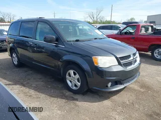 2011 Dodge Grand Caravan Crew with VIN 2D4RN5DG3BR660235, listed as a IAAI auction lot 41945522 with 148,924 mi miles and . Bid and sale history available at DreamBid. Image 1.
