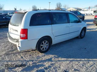 2010 Chrysler Town & Country Touring with VIN 2A4RR5D18AR310587, listed as a IAAI auction lot 41223813 with 144,626 mi miles. Bid and sale history available at carsss.com. Image 4.