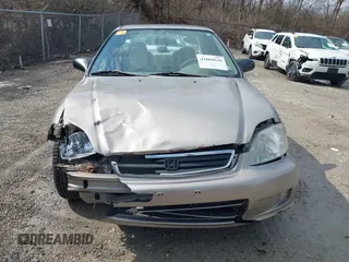 2000 Honda Civic LX with VIN 1HGEJ6574YL029220, listed as a IAAI auction lot 41669636 with 248,232 mi miles and . Bid and sale history available at carsss.com. Image 13.