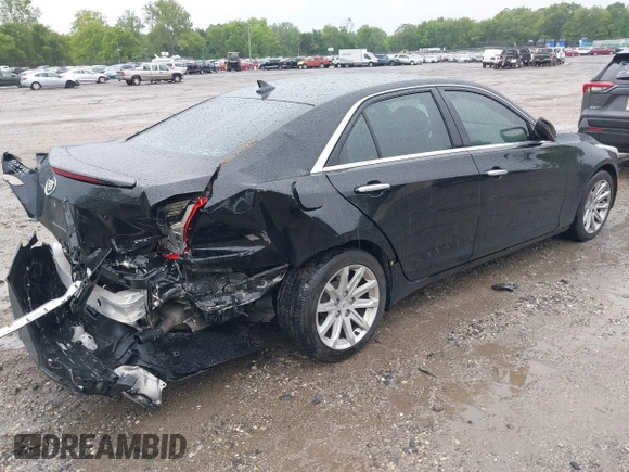 2014 Cadillac CTS AWD z VIN 1G6AW5SX4E0129136, wystawiony jako IAAI lot #42364098 z przebiegiem 137 080 mil mil oraz . Historia ofert i sprzedaży dostępna na DreamBid. Obrazek 4.