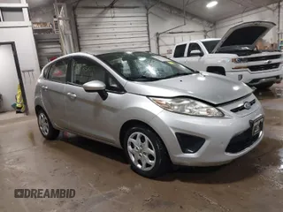 2011 Ford Fiesta SE with VIN 3FADP4EJ8BM138140, listed as a IAAI auction lot 41858510 with 38,475 mi miles. Bid and sale history available at carsss.com. Image 1.