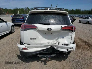 2018 Toyota RAV4 LE with VIN JTMBFREV4JJ720011, listed as a Copart auction lot 54916955 with 135,717 mi miles and Salvage Title. Bid and sale history available at carsss.com. Image 6.