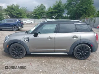 2018 MINI Countryman Cooper z VIN WMZYV5C39J3E02982, wystawiony jako IAAI lot #42384795 z przebiegiem 74 599 mil mil oraz . Historia ofert i sprzedaży dostępna na DreamBid. Obrazek 14.