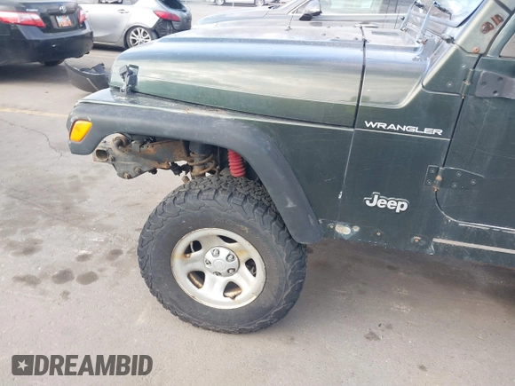 1998 Jeep Wrangler SE with VIN 1J4FY29P1WP760687, listed as a IAAI auction lot 41720889 with 210,592 mi miles. Bid and sale history available at carsss.com. Image 6.